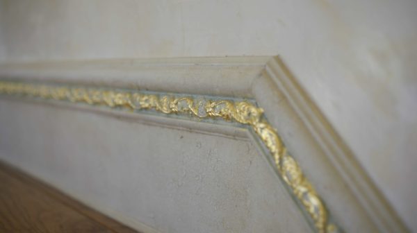 Gilded ornament on ceiling