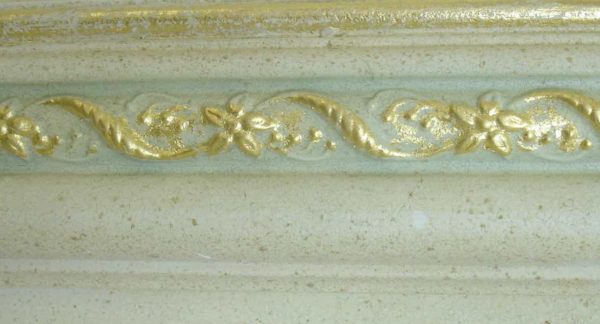 Gilding over plaster with color