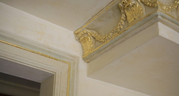 Plaster molding with gold leaf