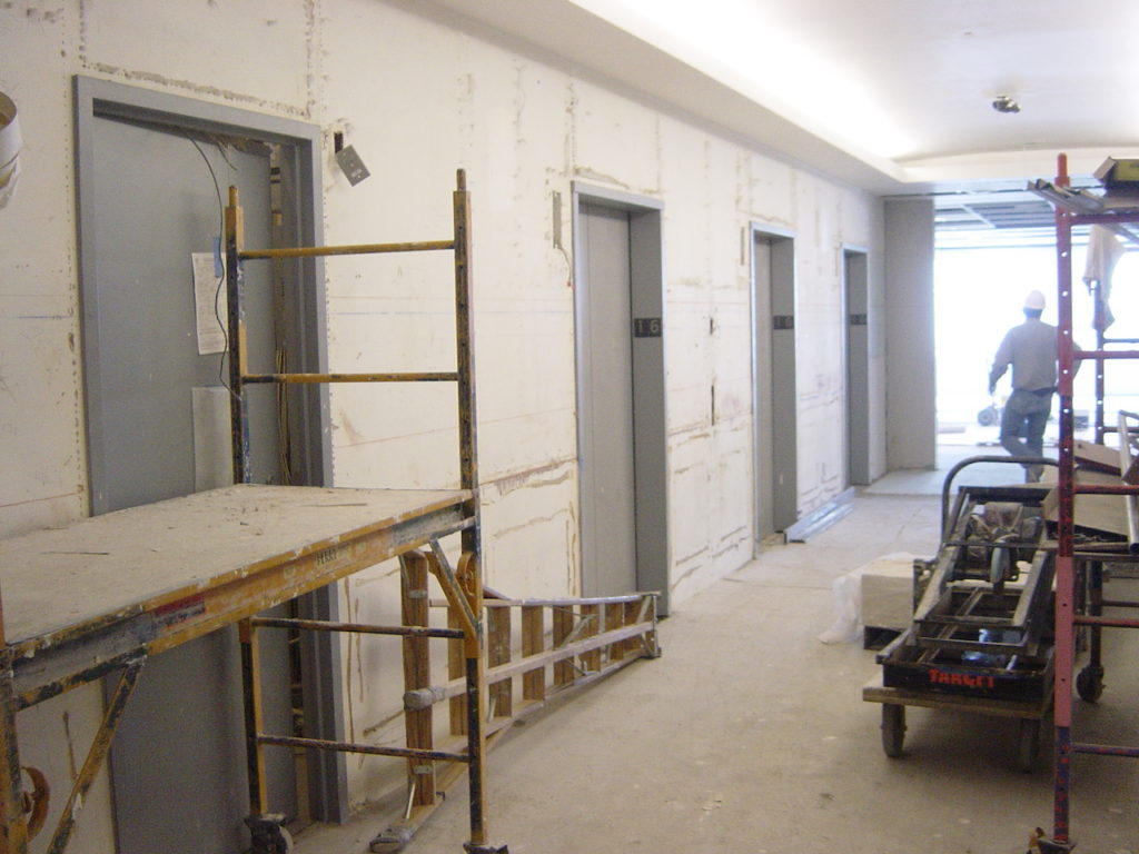 Elevator lobby under construction before paint